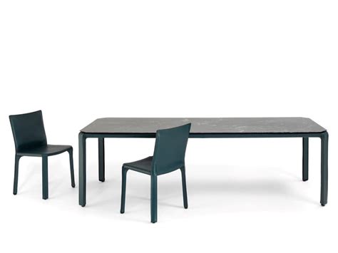 Cassina cab tab Cab Tab is a table designed by Mario Bellini for the Cassina brand
